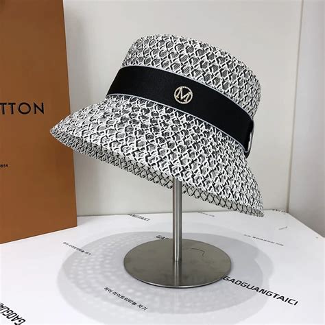 cappellino visiera dior|Cappelli da donna di Dior a partire da 295 € .